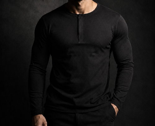 Man wearing the NORE Henley in black, fitted long-sleeve henley shirt, front view