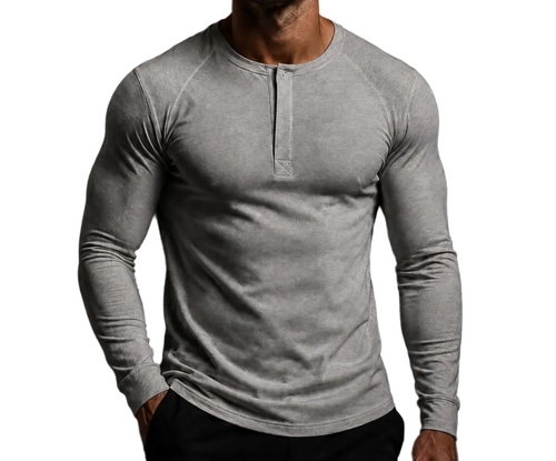 Man wearing the NORE Henley in heather gray, tapered long-sleeve henley, front view