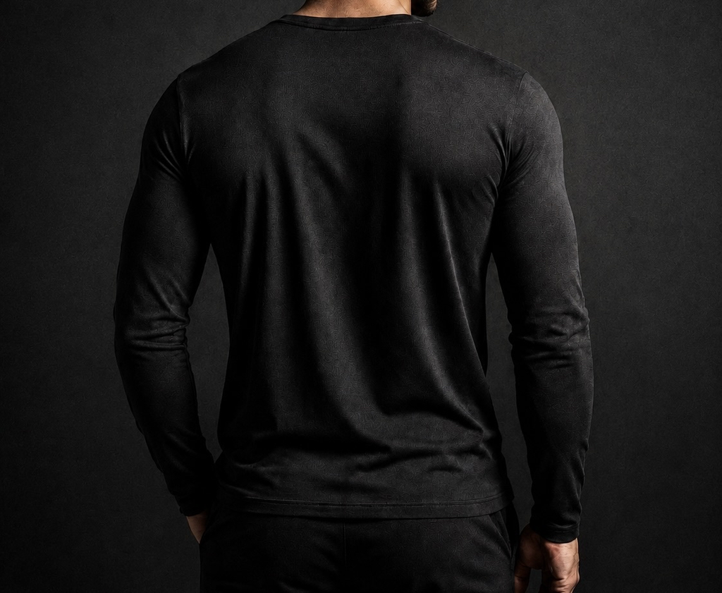 Back view of the black NORE Henley showing the tapered fit