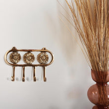 Load image into Gallery viewer, Wall Hook Daisy Brass on wall
